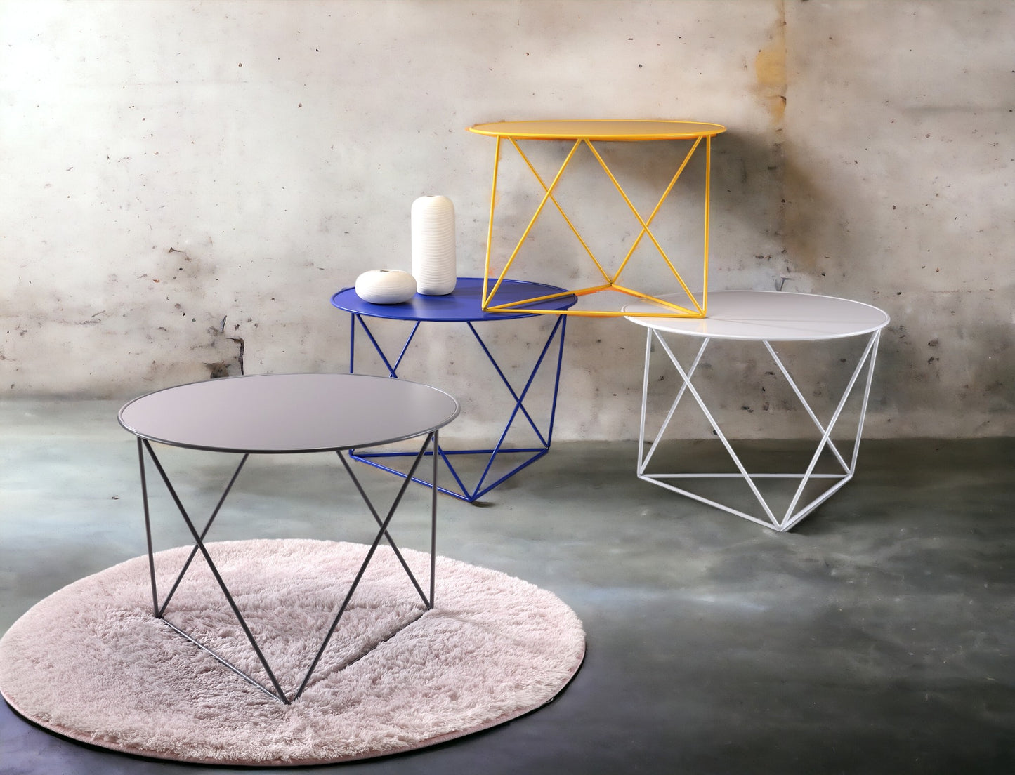 Modern grey metal side table on fluffy pink rug clean design