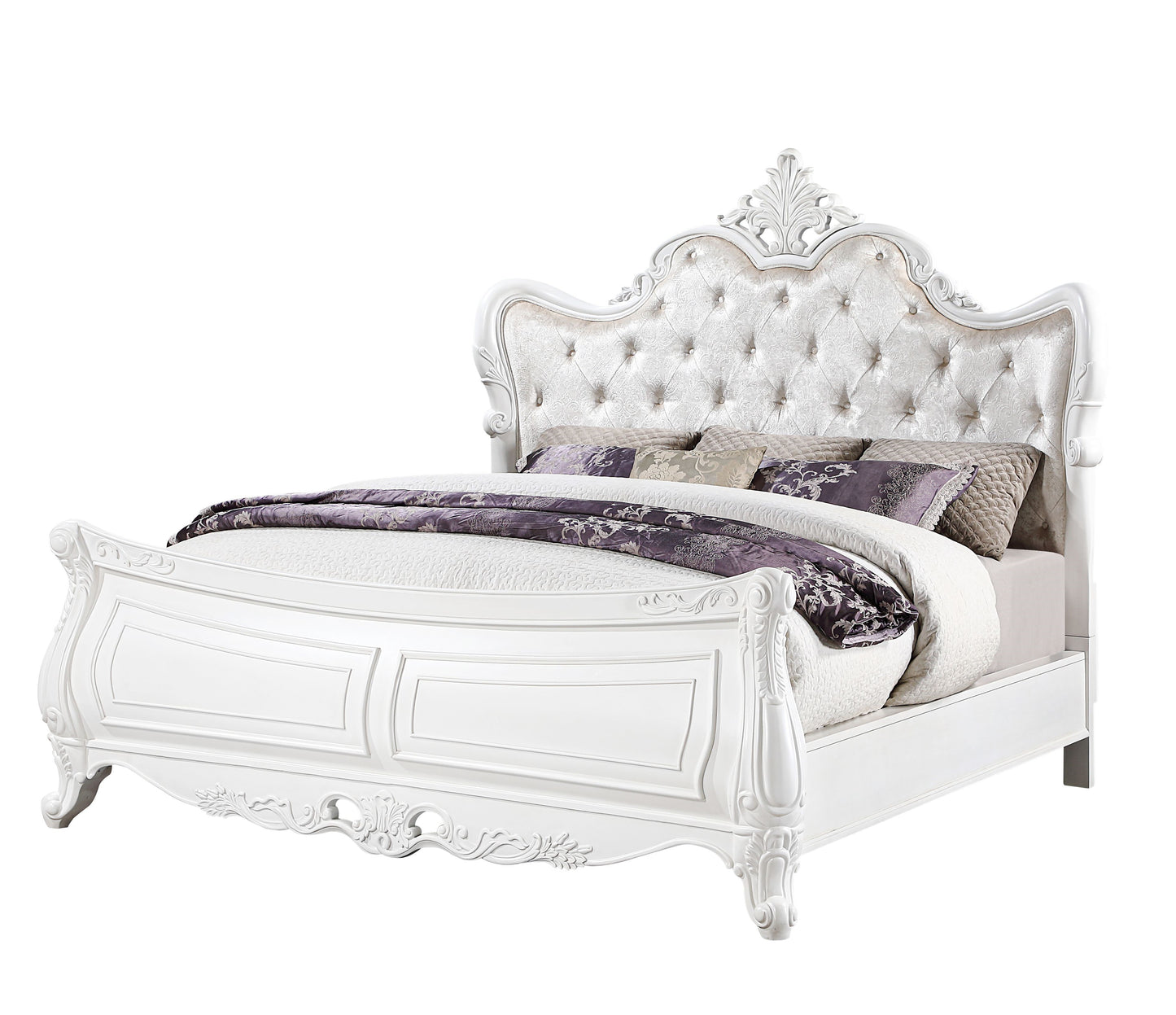 Luxurious white sleigh bed with tufted headboard and ornate carvings perfect for a grand bedroom