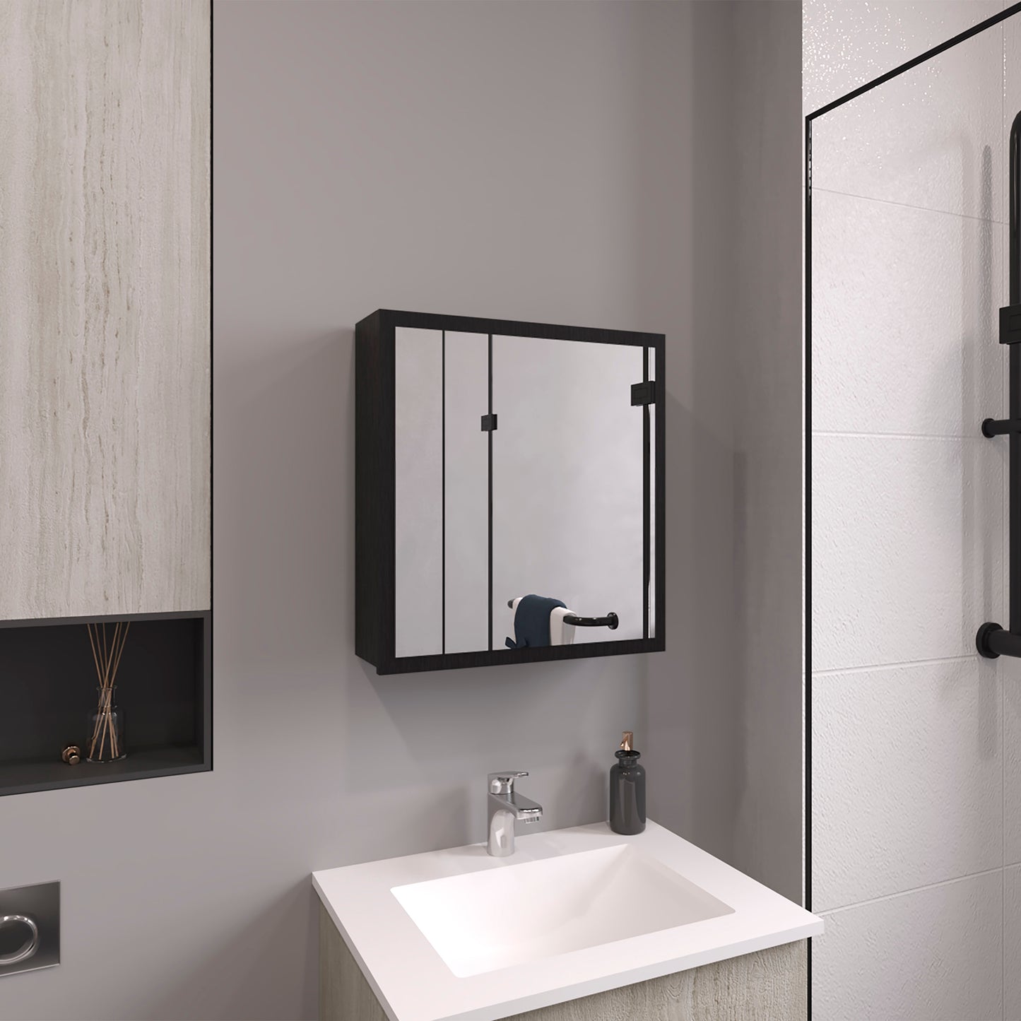 Modern black medicine cabinet with mirrored doors and silver handle