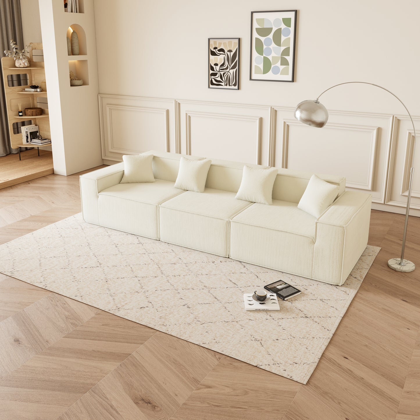 Cream fabric sectional sofa with plush throw pillows on a patterned rug
