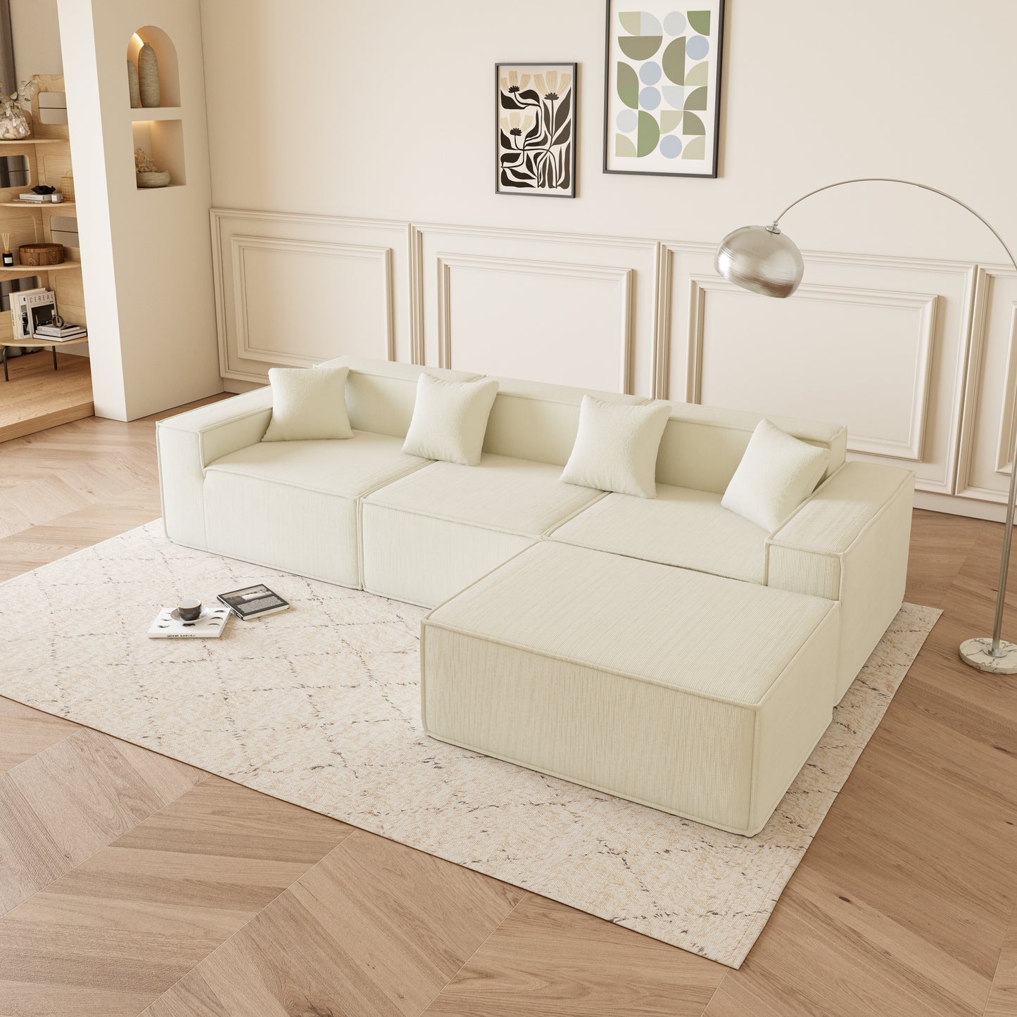 Cream modular sectional sofa with plush cushions on a patterned rug
