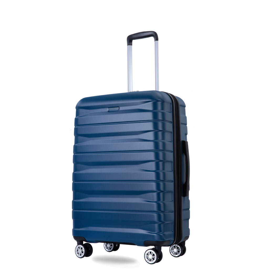 Deep blue hardshell spinner suitcase with textured horizontal grooves and a telescopic handle for travel