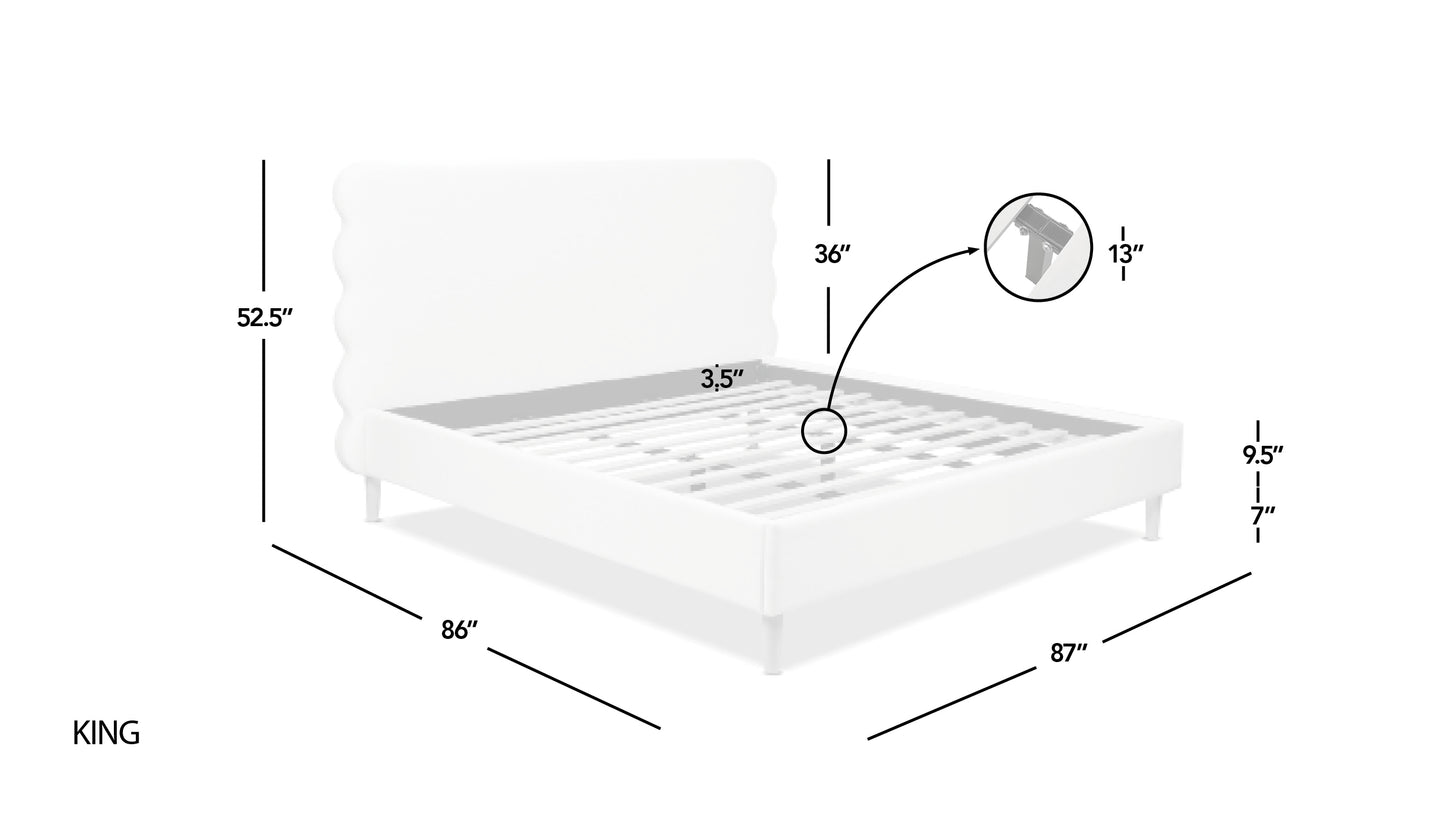 King size platform bed frame with white upholstered headboard and wooden slats for mattress support