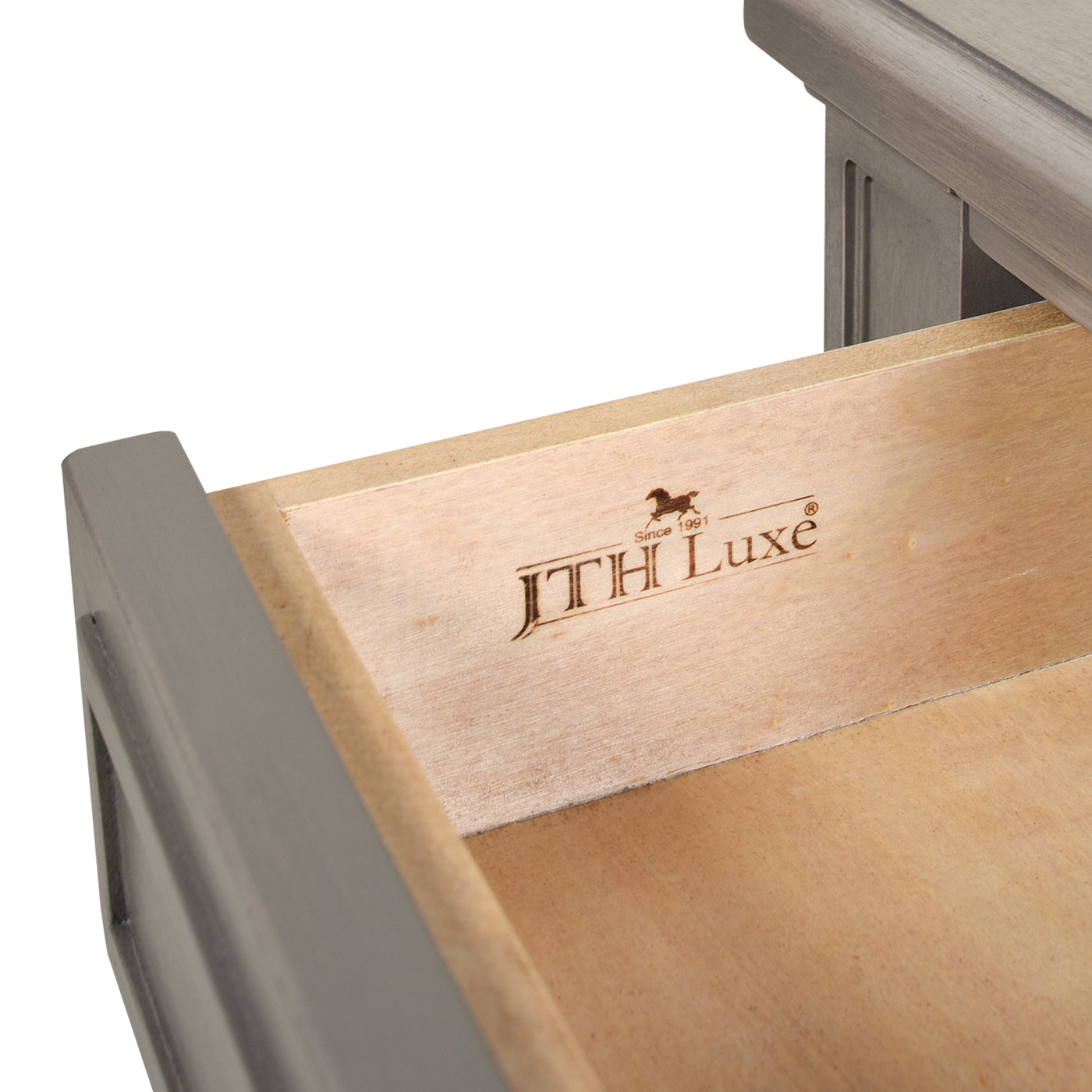 Gray wooden dresser drawer interior with JTH Luxe logo and horse icon