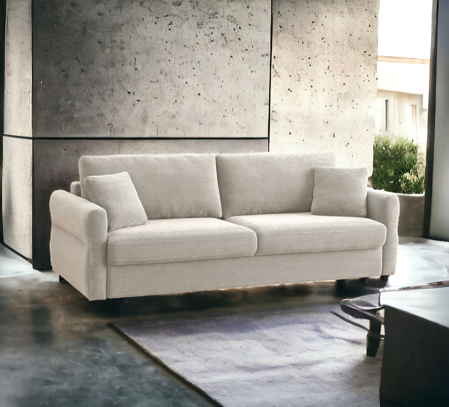 Comfortable cream corduroy sofa with plush cushions and throw pillows perfect for modern living rooms