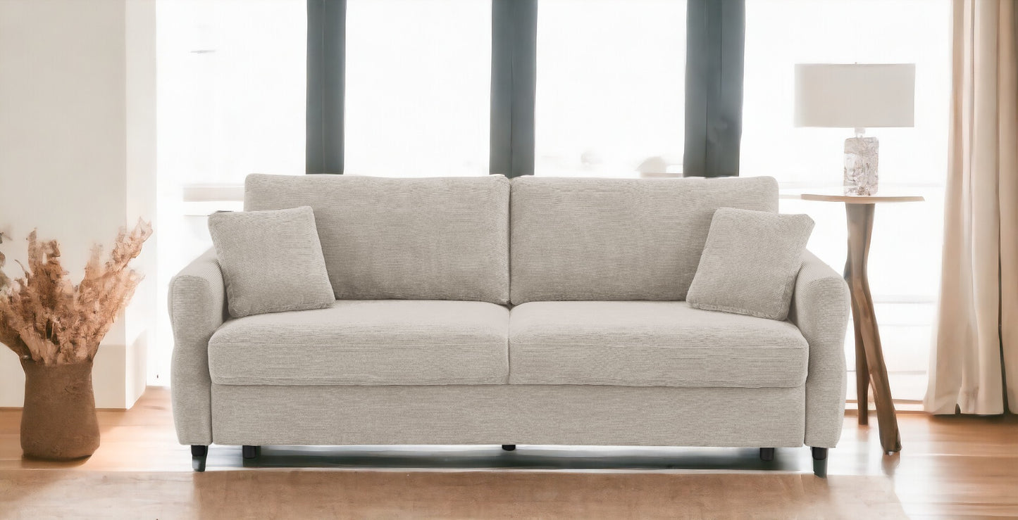 Light beige corduroy sofa with plush cushions and modern design perfect for living room relaxation