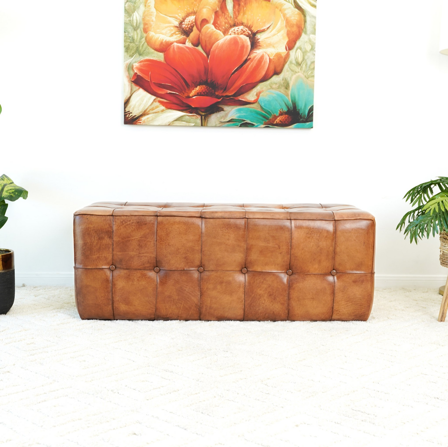Tufted cognac leather bench with button tufting and quilted design for living rooms