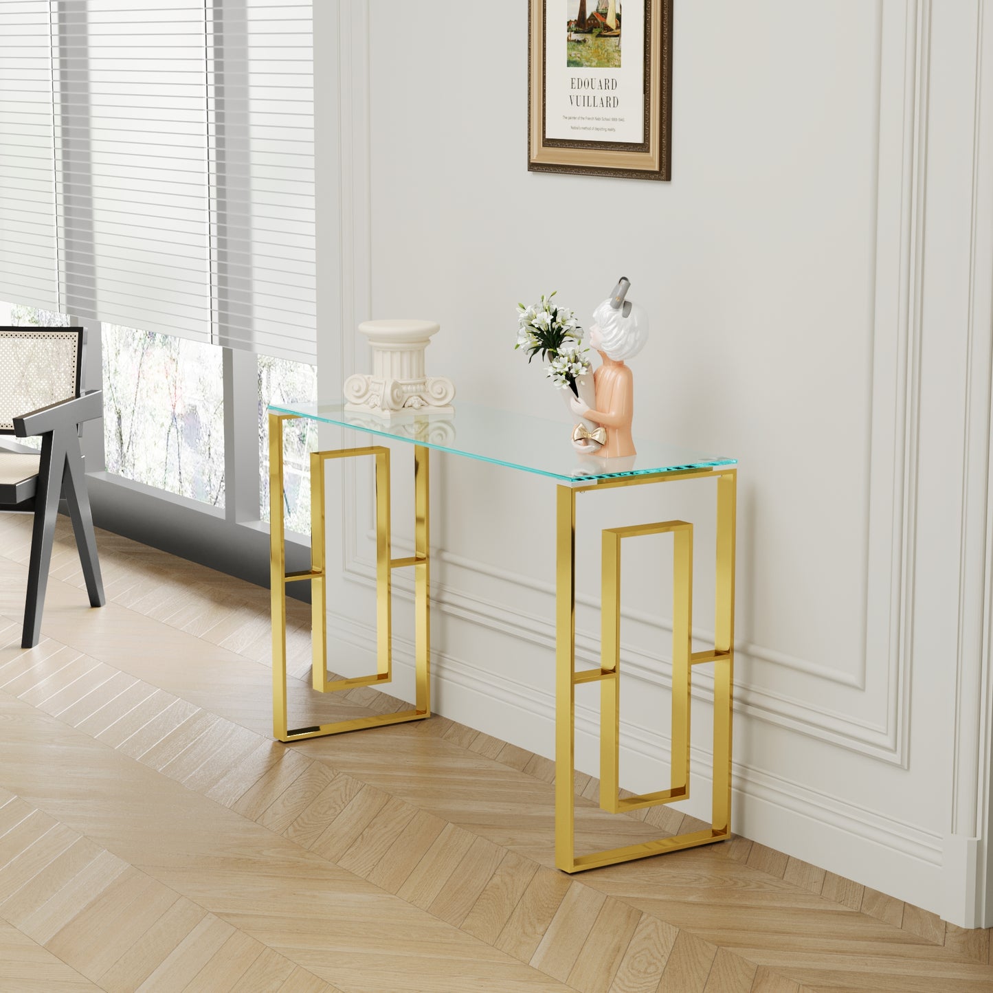 Modern glass console table with a gold geometric base Elegant and stylish