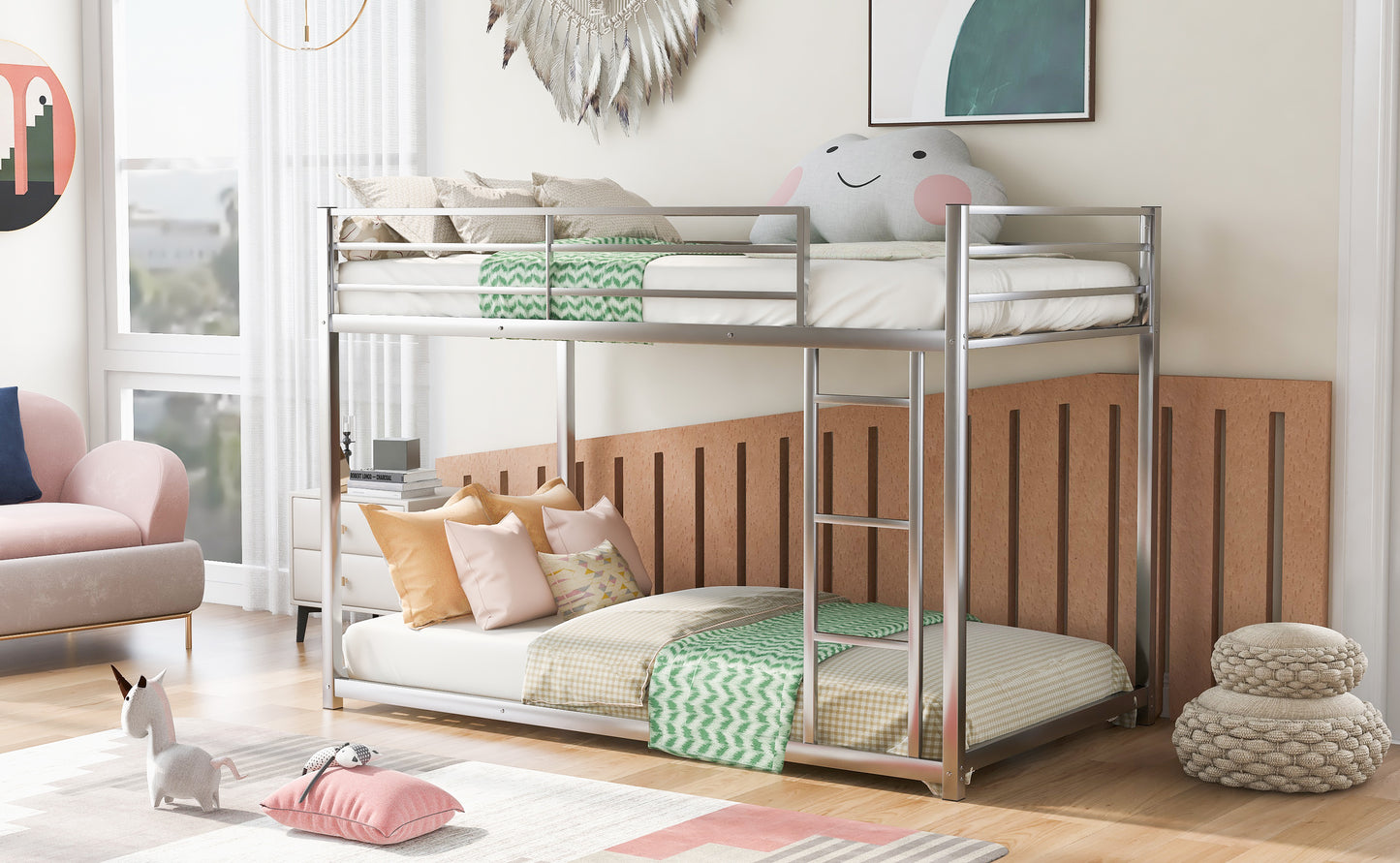 Sleek silver metal twin over twin bunk bed with green patterned blankets and wood accents