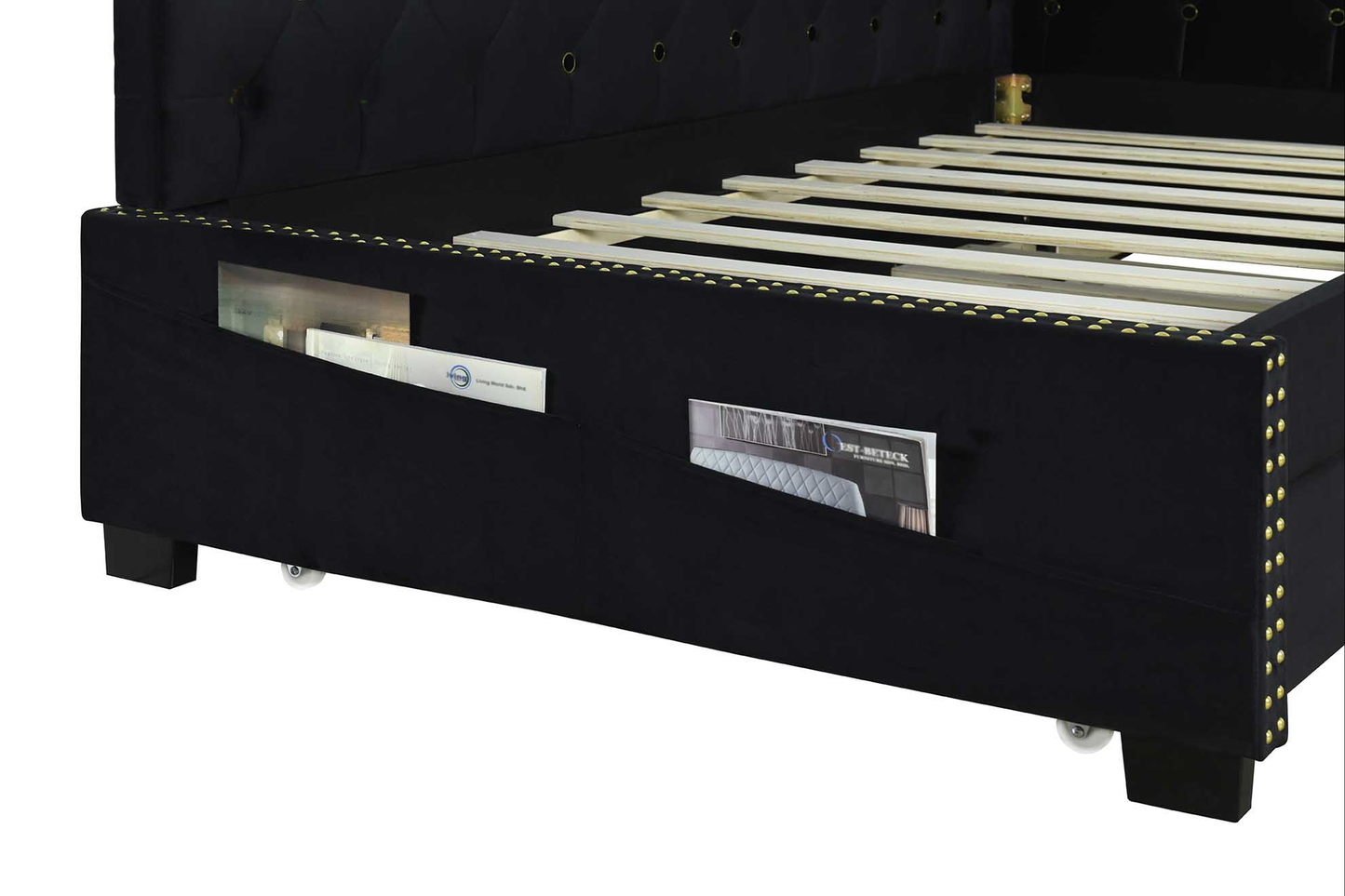 Black velvet bed frame with studded details and storage pockets