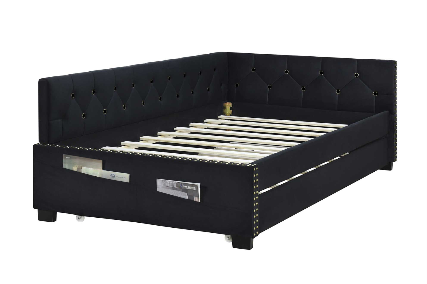Black velvet daybed with tufted backrest and nailhead trim