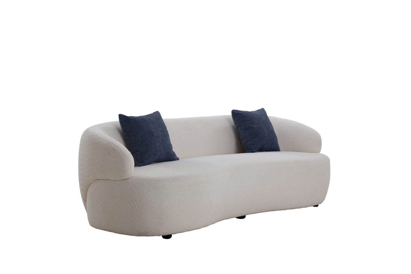 Cream boucl curved sofa with two navy decorative pillows