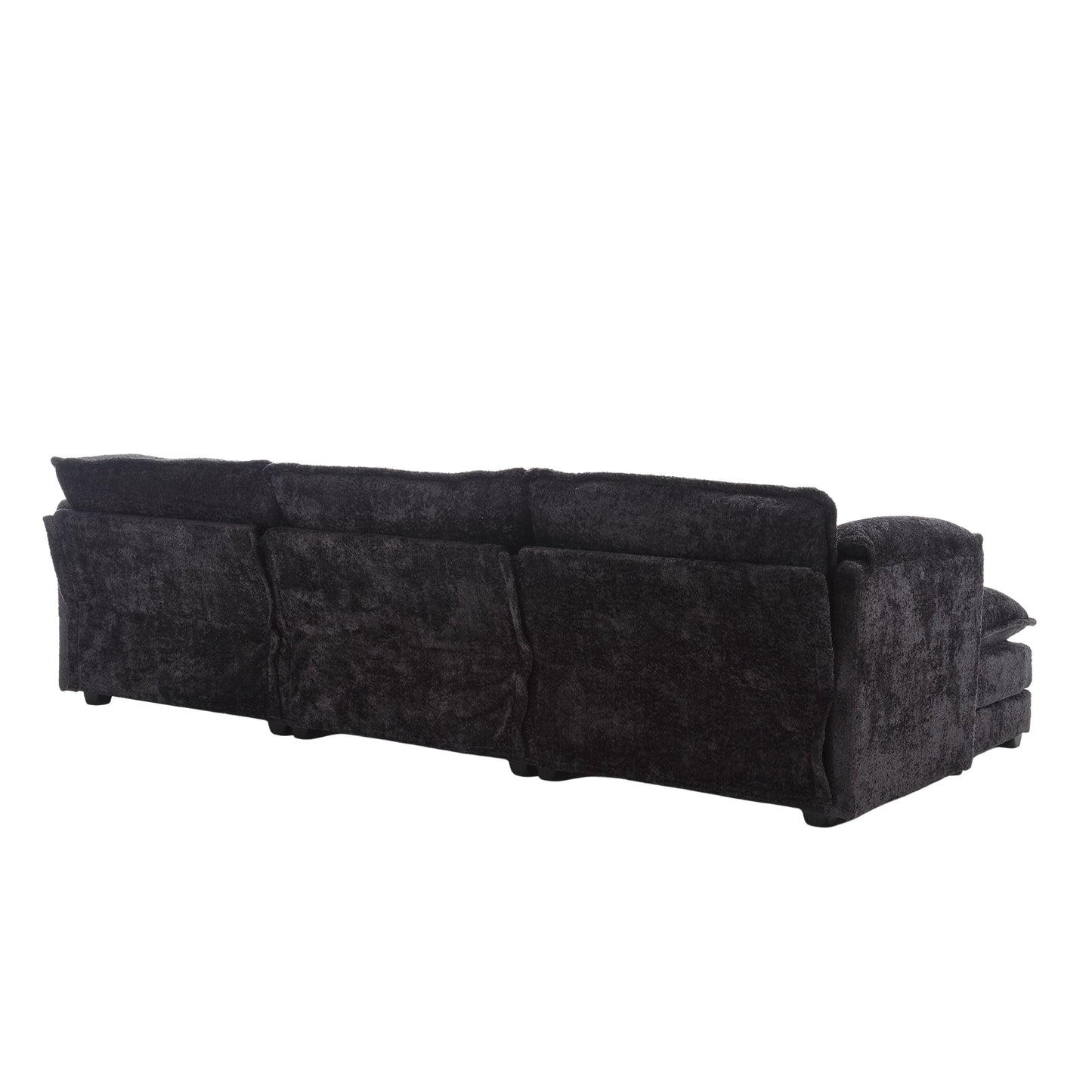 View of the back of a plush black fabric sectional sofa with adjustable headrests