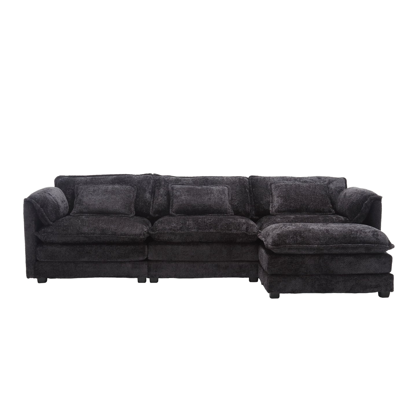 Dark charcoal sectional sofa with plush fabric and three accent pillows perfect for modern living rooms