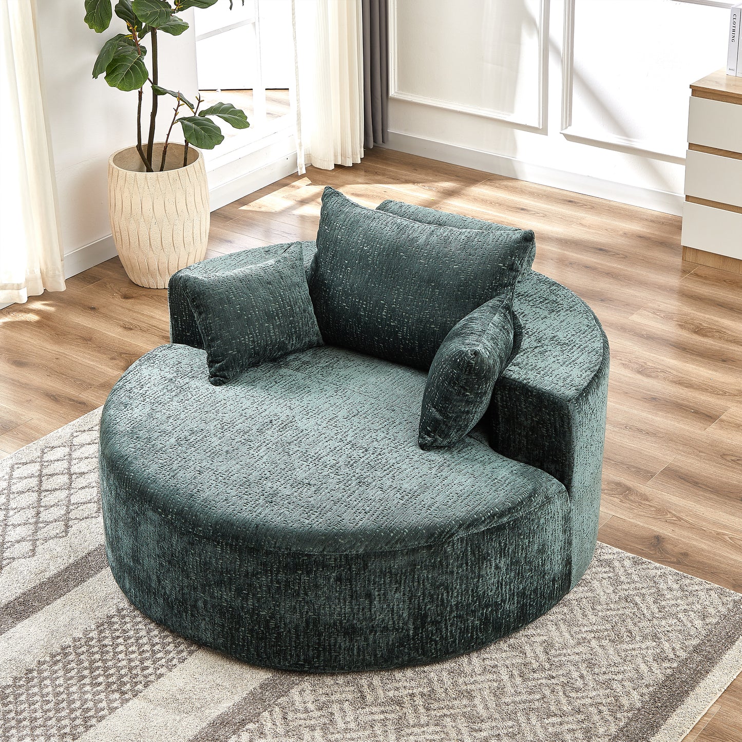 Plush teal velvet round accent chair with textured fabric and lumbar pillows for modern living rooms