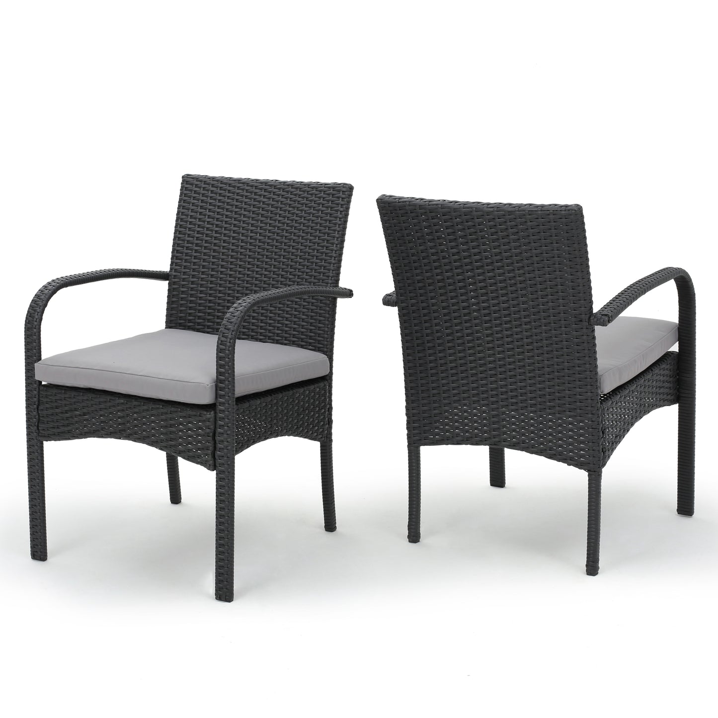 Two dark gray wicker patio chairs with light gray seat cushions ideal for outdoor dining