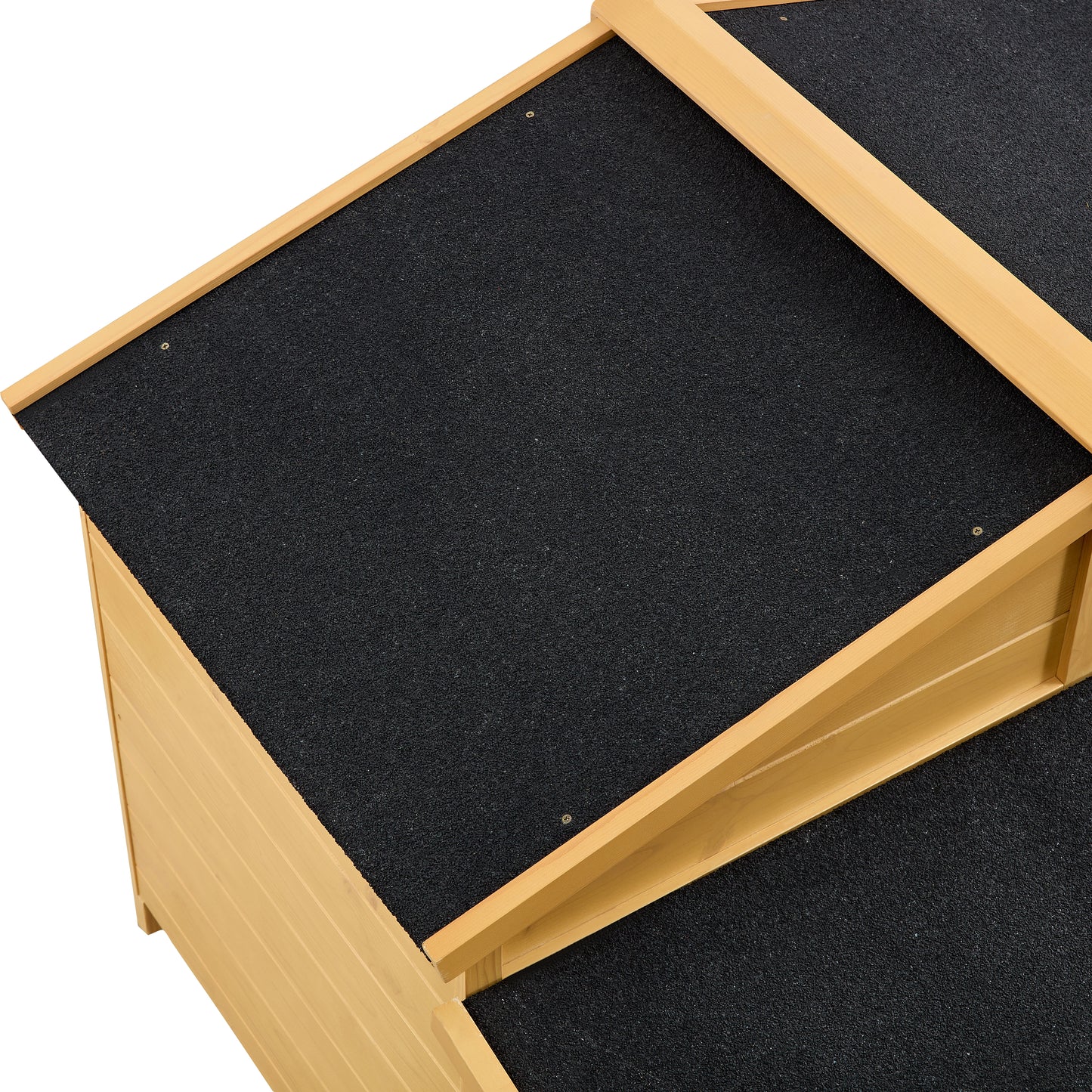 Wooden dog house with black asphalt roof detail providing weather protection for pets