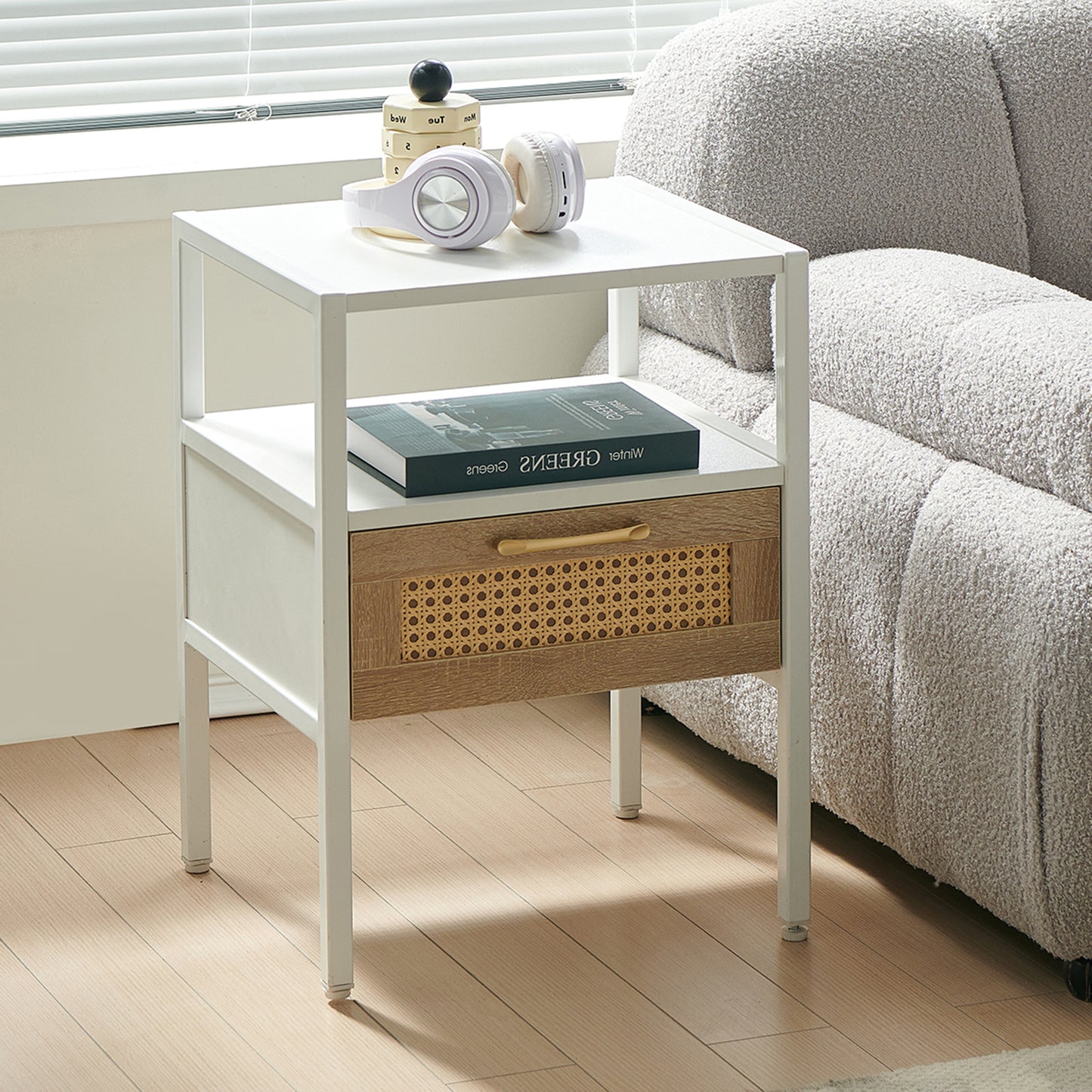 White metal frame side table with wood and rattan drawer front