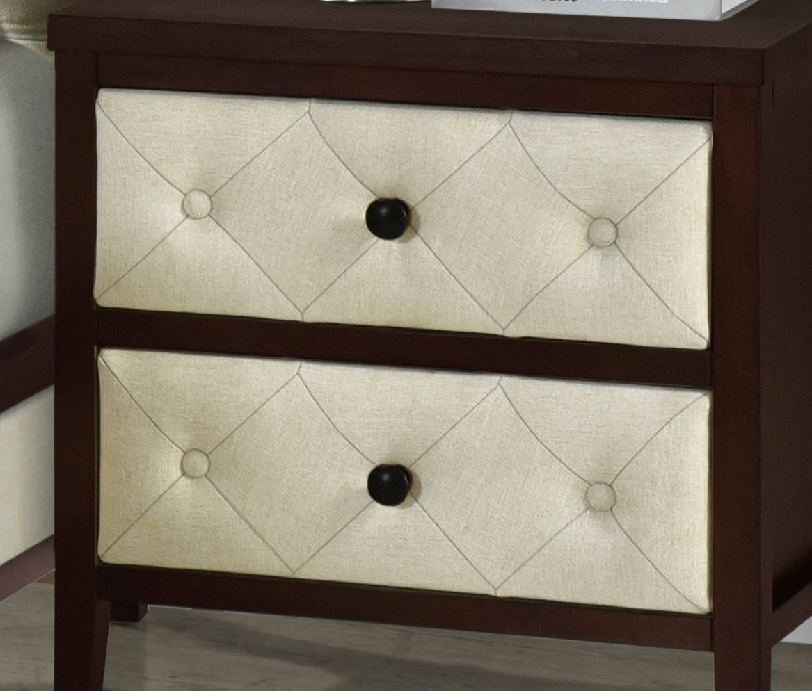 Dark wood nightstand with two tufted cream fabric drawers and black knobs