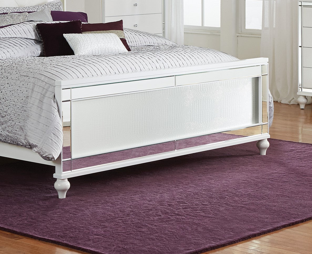 White mirrored platform bed frame with textured inset and plush purple rug