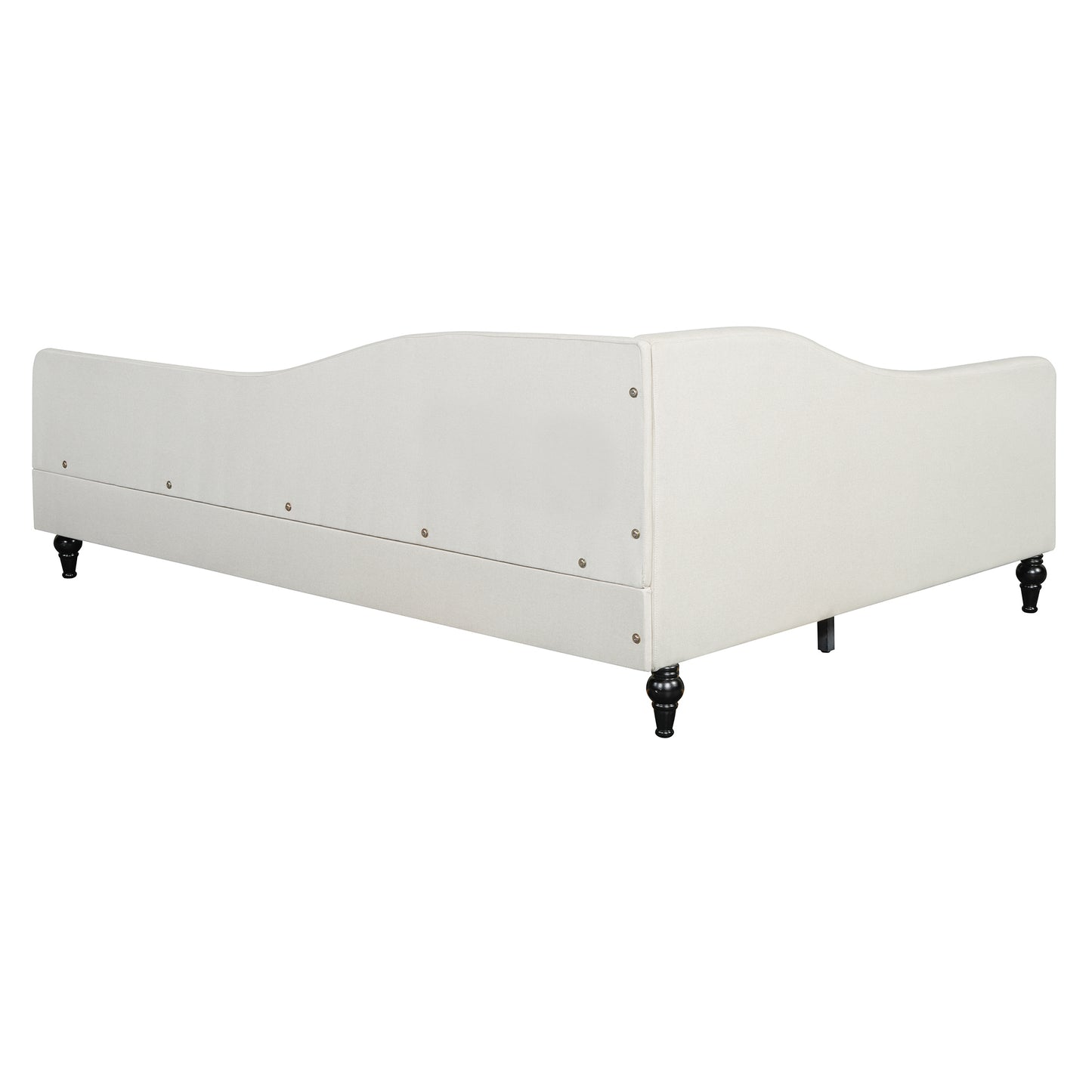 Cream upholstered daybed with curved back and black turned legs