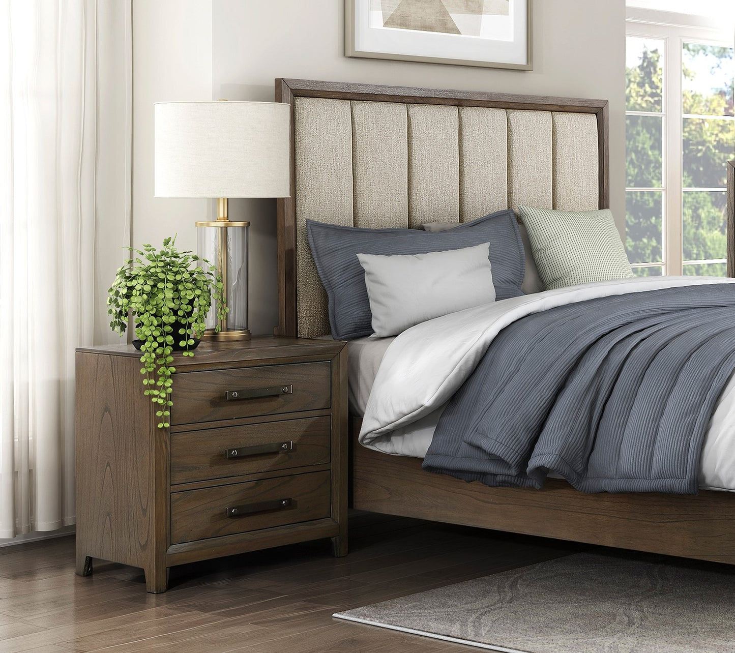 Dark wood threedrawer nightstand with metal pulls beside a bed
