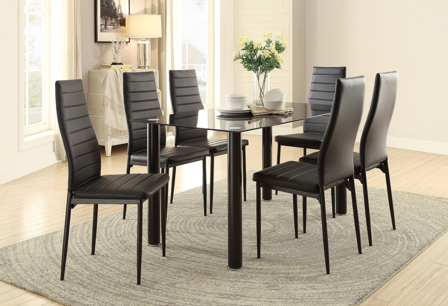 Modern dining set with a sleek glass top table and six black faux leather chairs