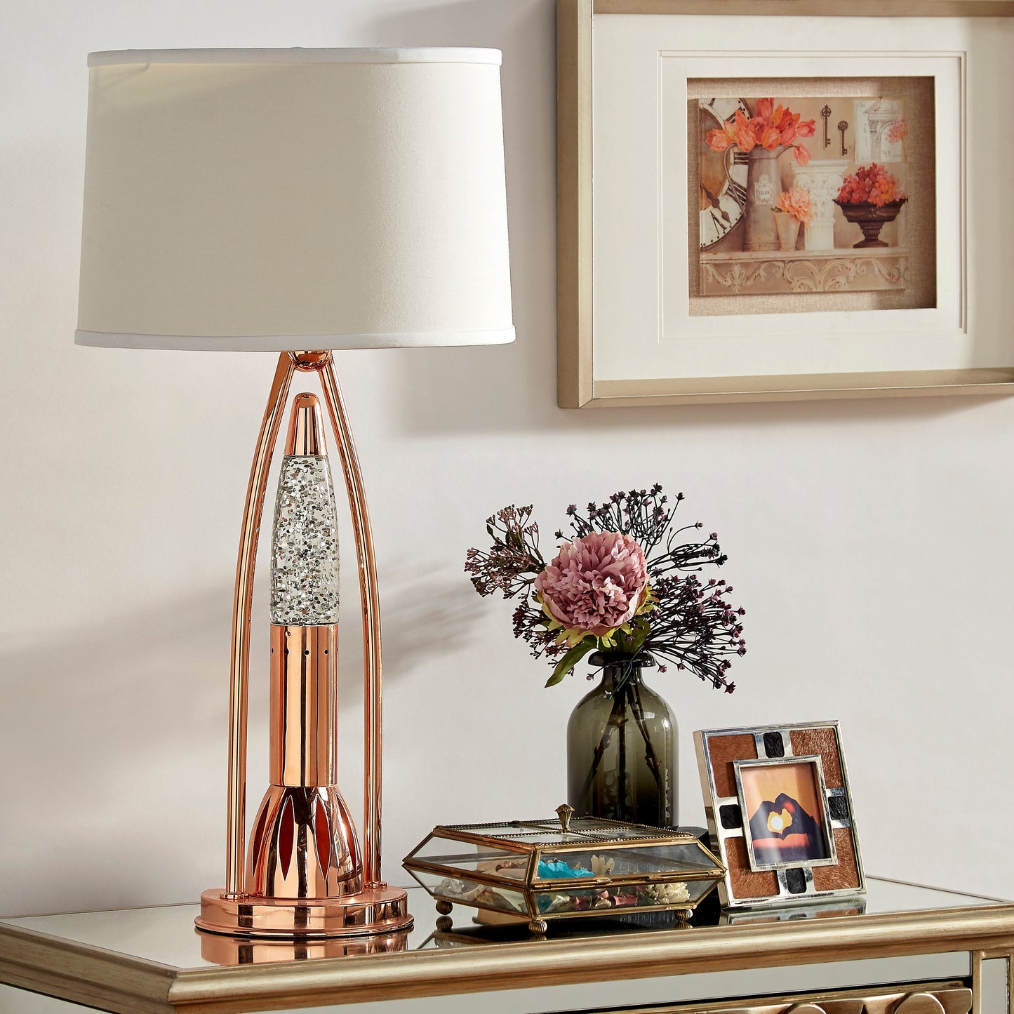 Rose gold table lamp with glitterfilled column and cream shade bedside lighting option