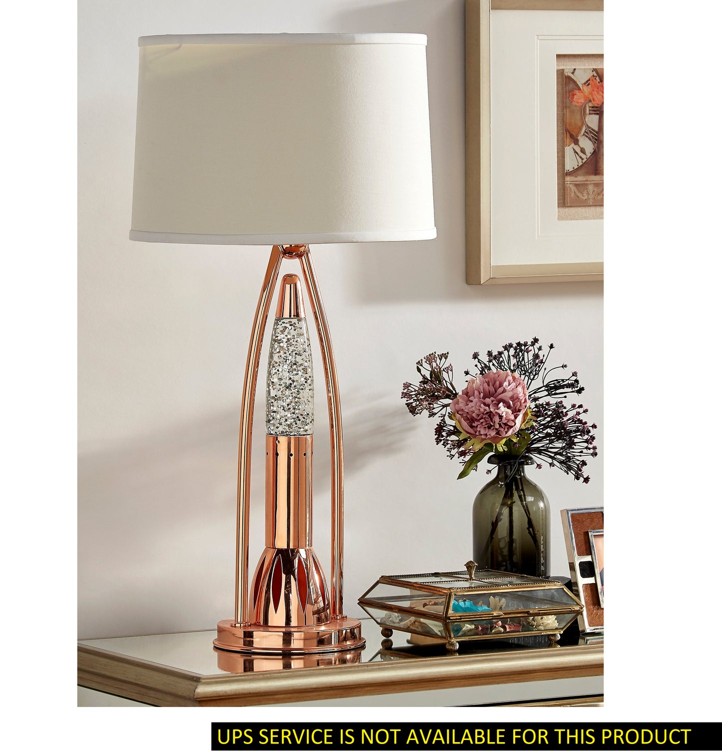 Rose gold table lamp with glitterfilled column and cream shade