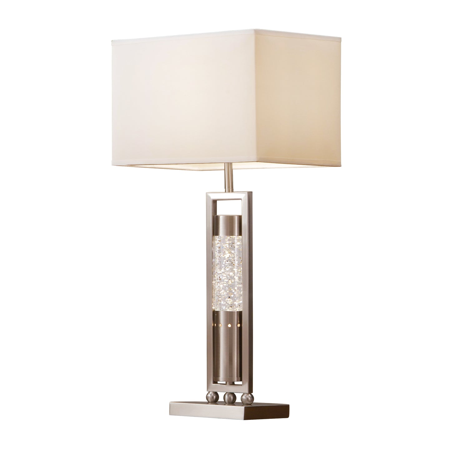 Modern silver table lamp with a rectangular cream shade and a clear glass column filled with iridescent accents
