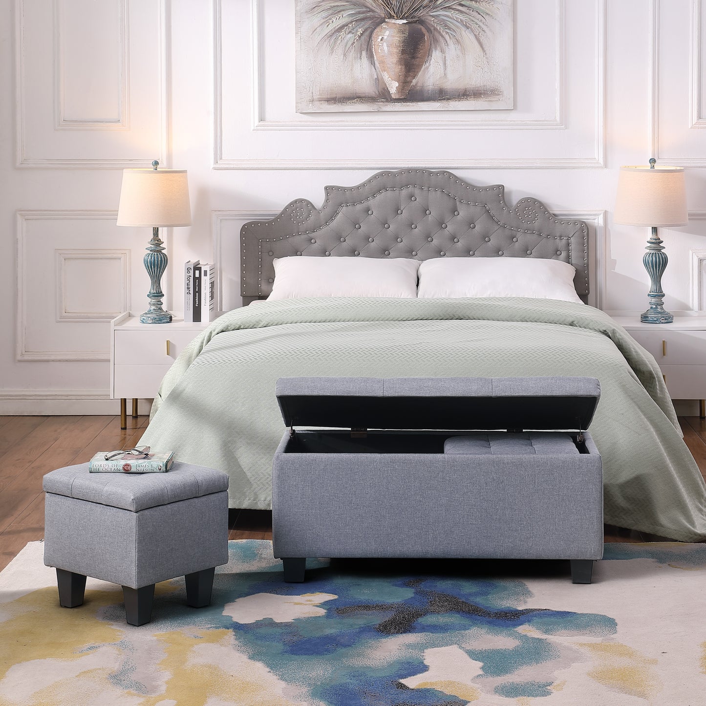 Gray fabric storage ottoman with tufted lid