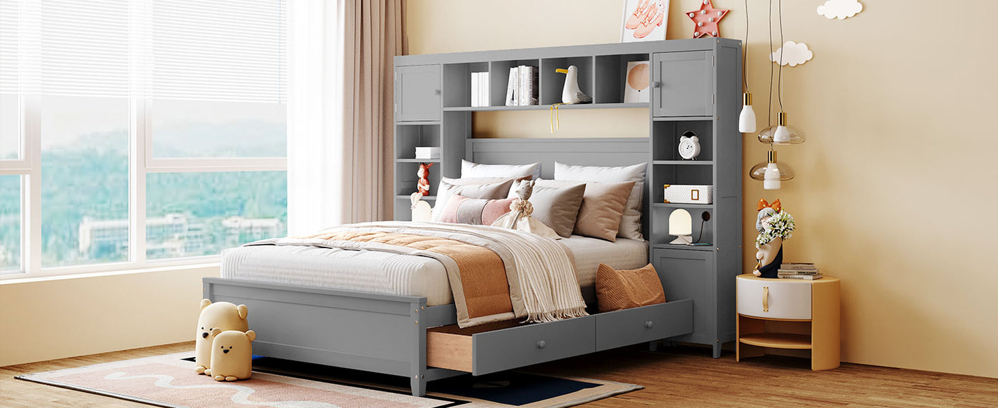 Gray wooden bed frame with integrated bookshelf headboard and storage drawers