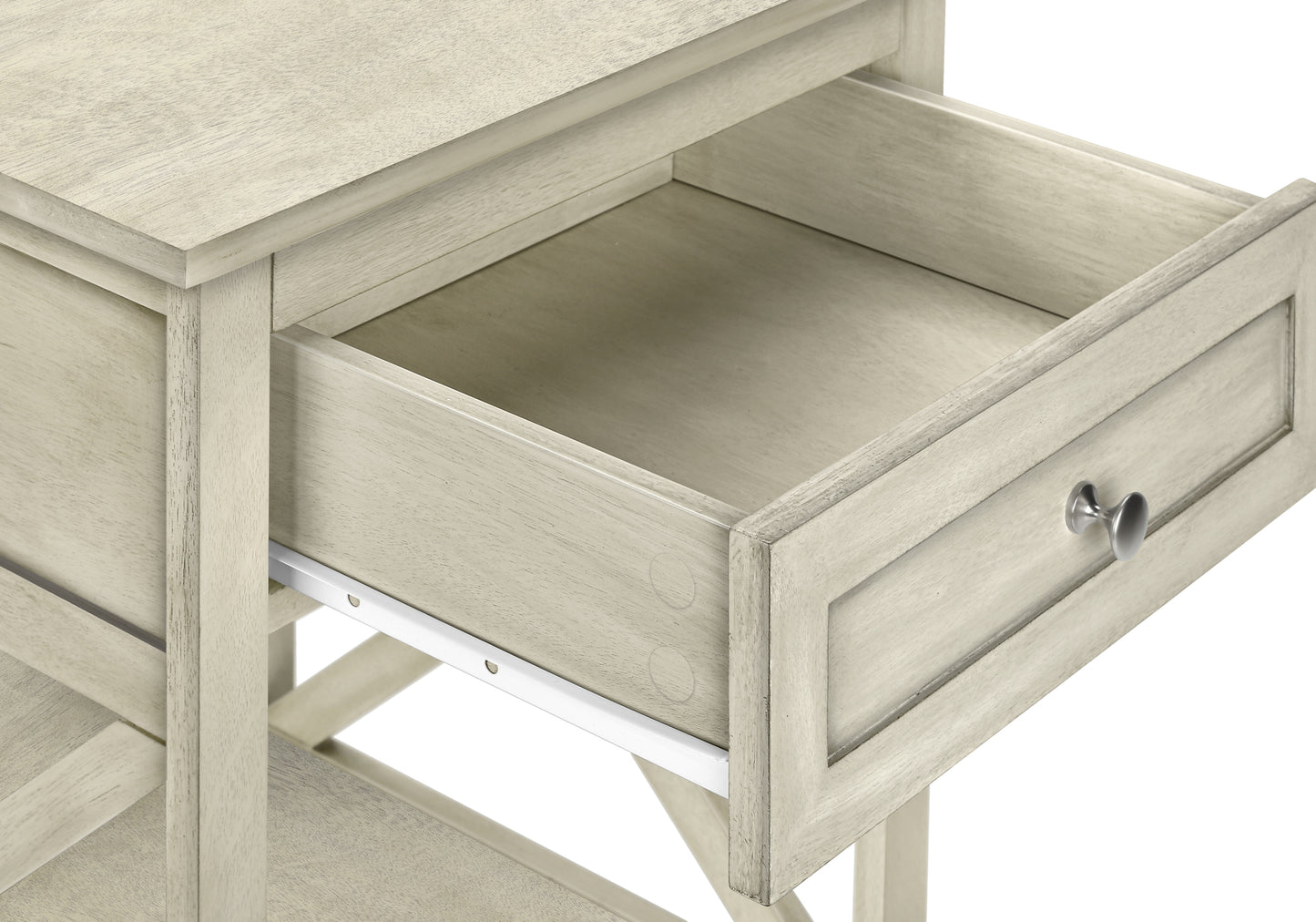 Whitewashed wood end table with an open drawer and silver knob