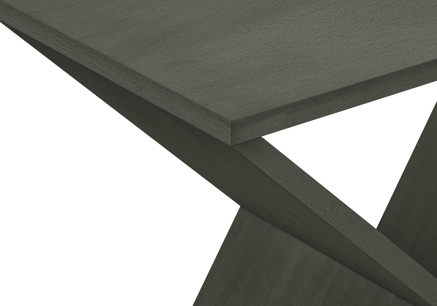 Closeup of a dark grey textured wooden dining table with angled legs