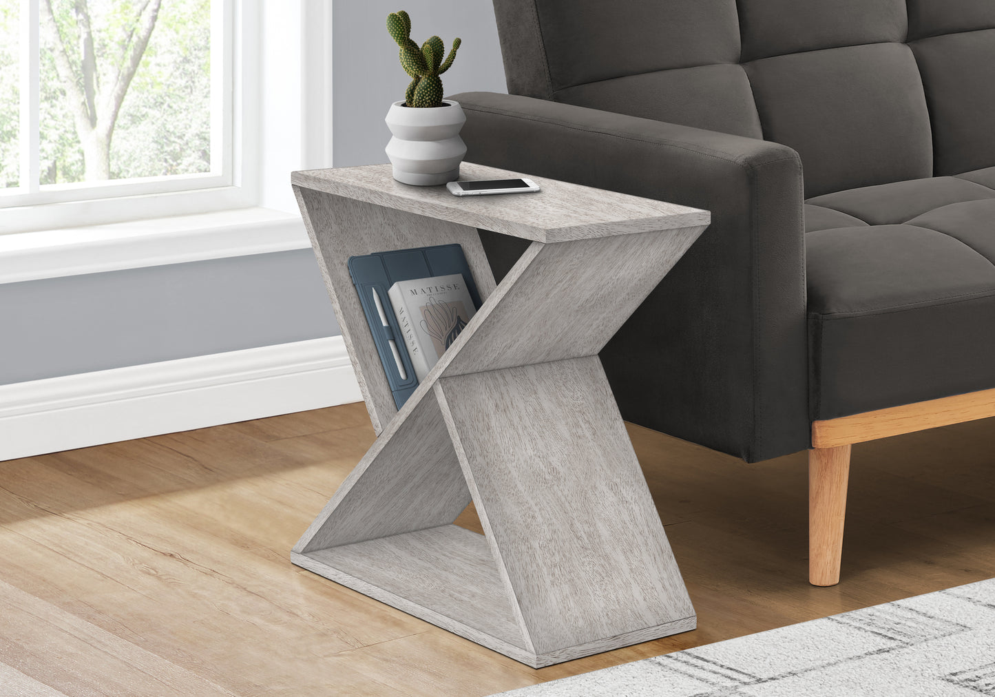 Modern Cshaped end table in weathered oak finish with open shelving
