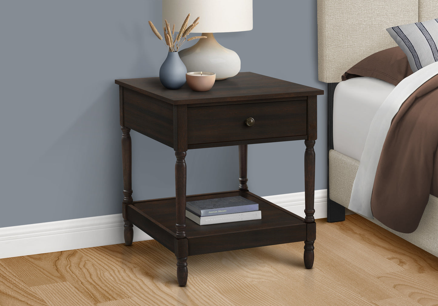Dark wood nightstand with drawer and shelf featuring decorative turned legs