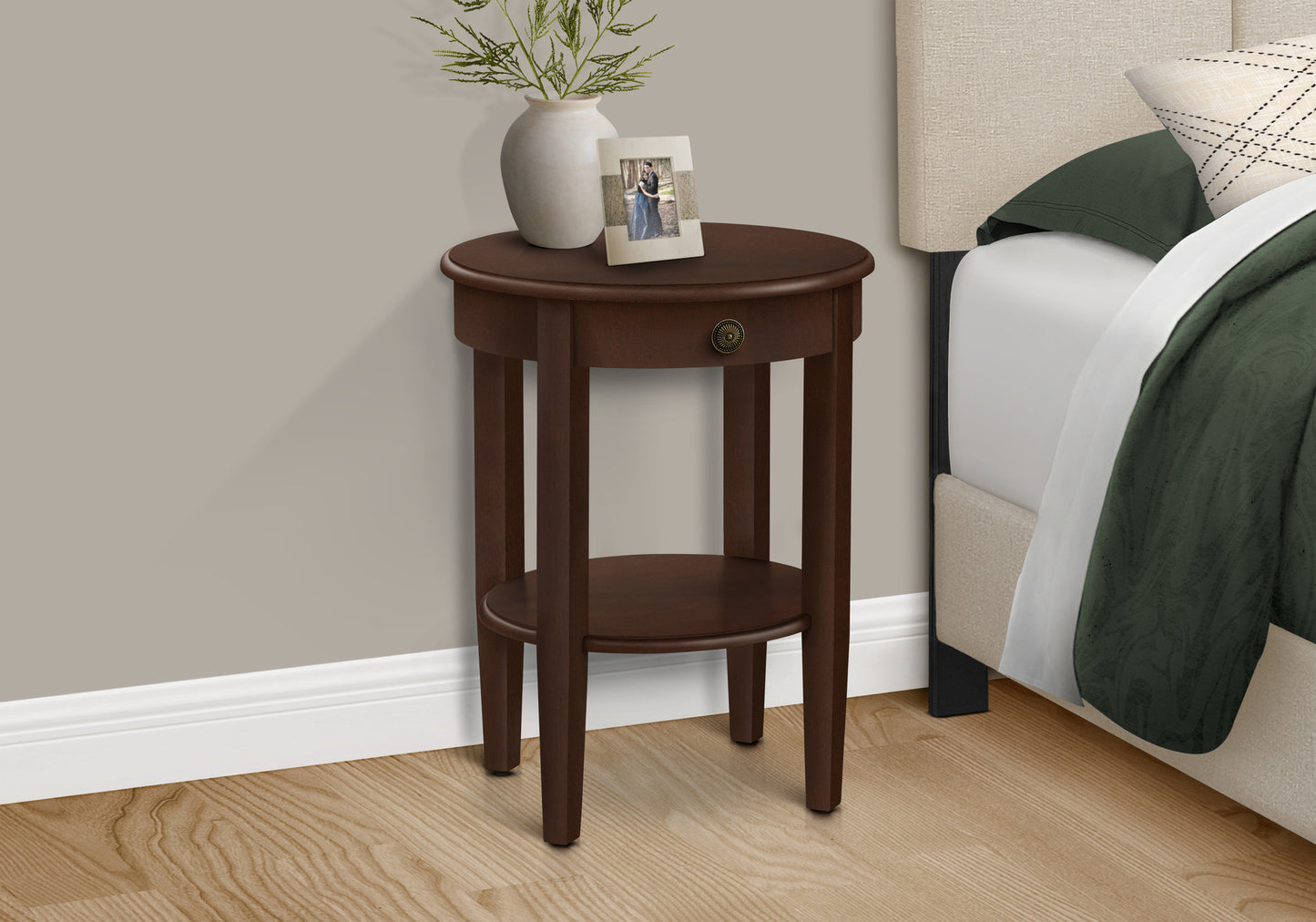Dark brown round end table with one drawer and open shelf for bedroom storage