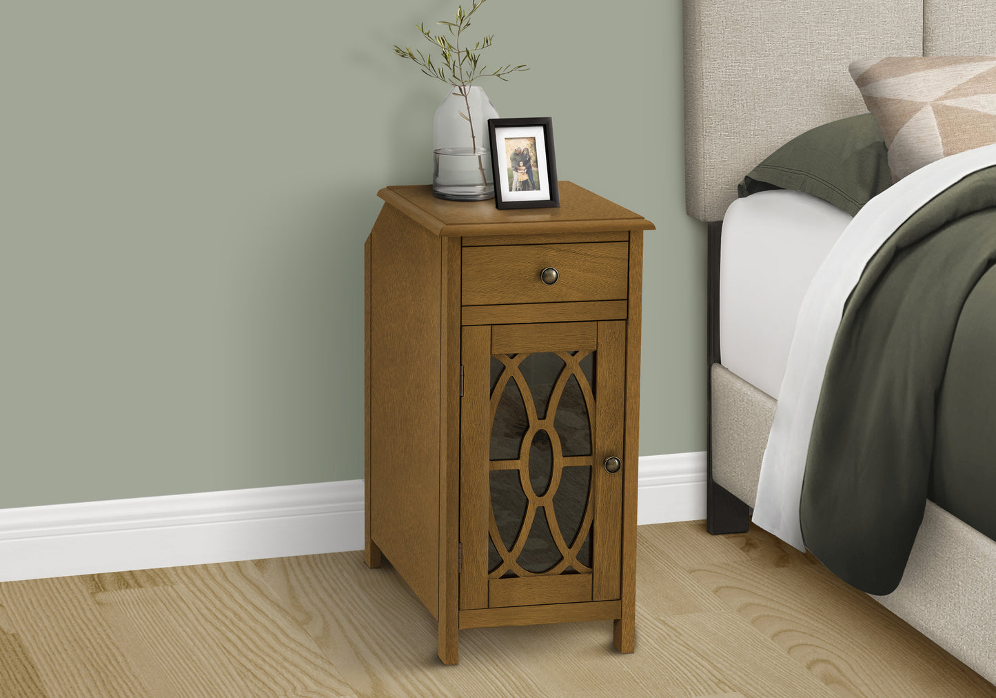 Small oak bedside table with drawer and decorative glass door perfect for bedroom storage