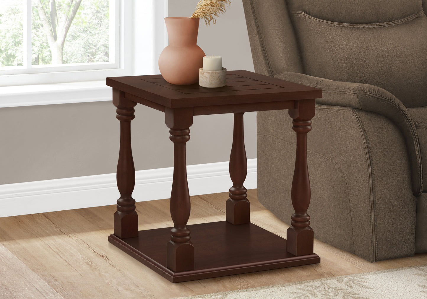 Dark brown wooden end table with carved legs and slatted top