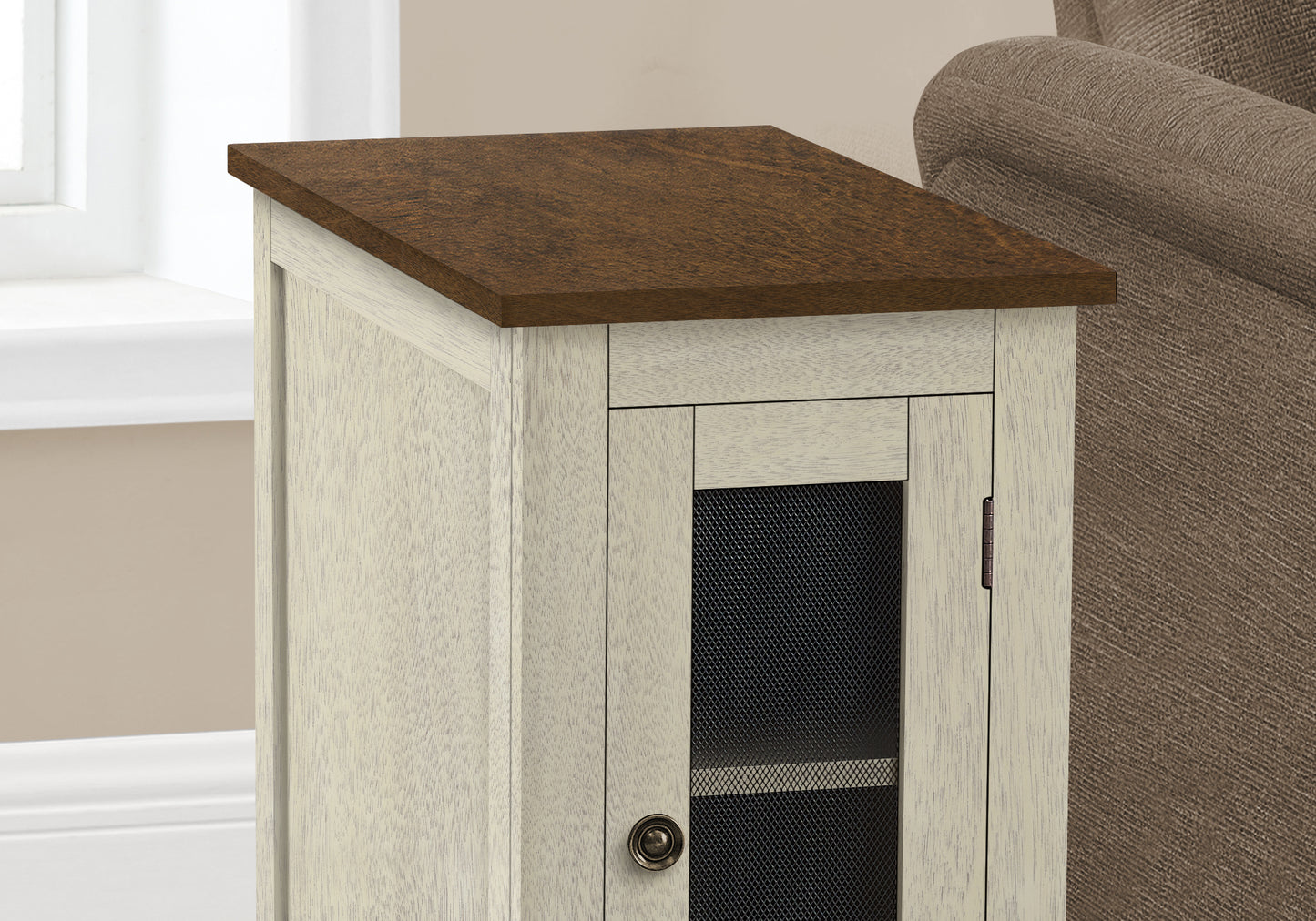 White distressed wood accent cabinet with dark wood top and mesh door
