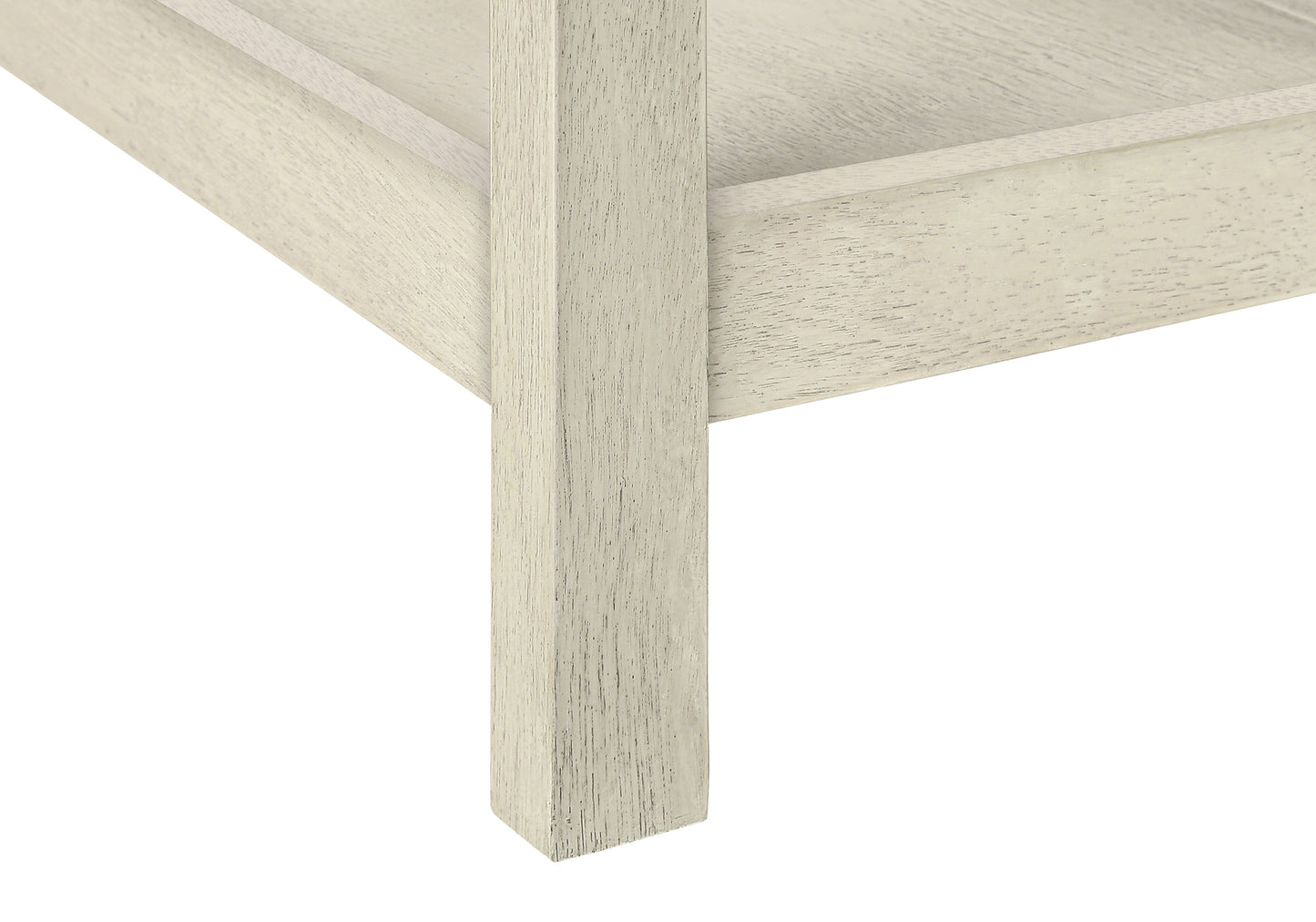 Distressed cream wood furniture leg detail with visible grain texture