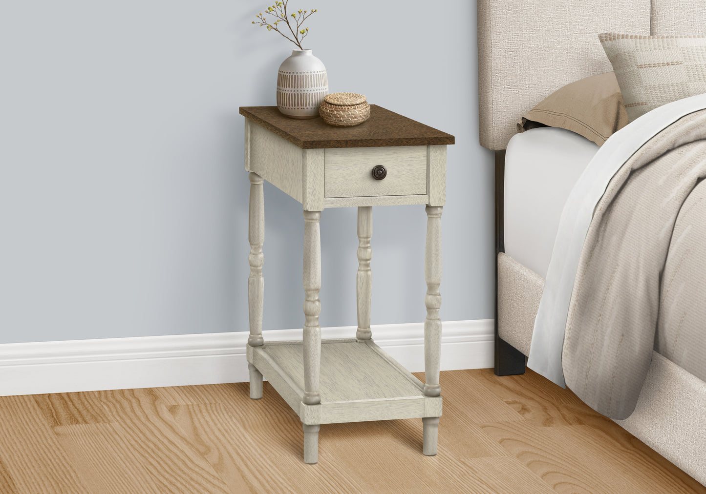 White distressed wood end table with drawer and decorative vase perfect for bedside storage