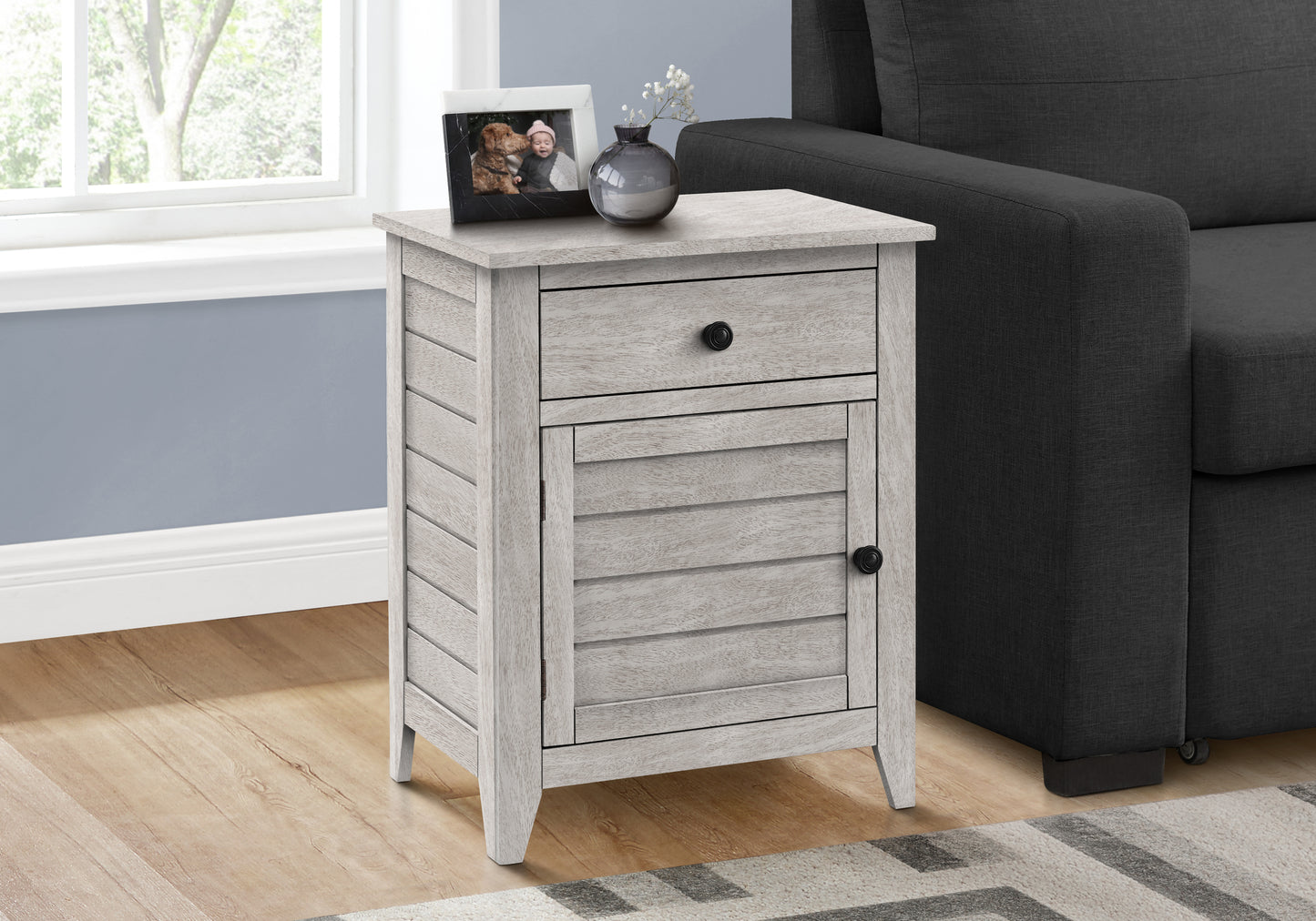 Distressed white wood bedside table with one drawer and one cabinet door