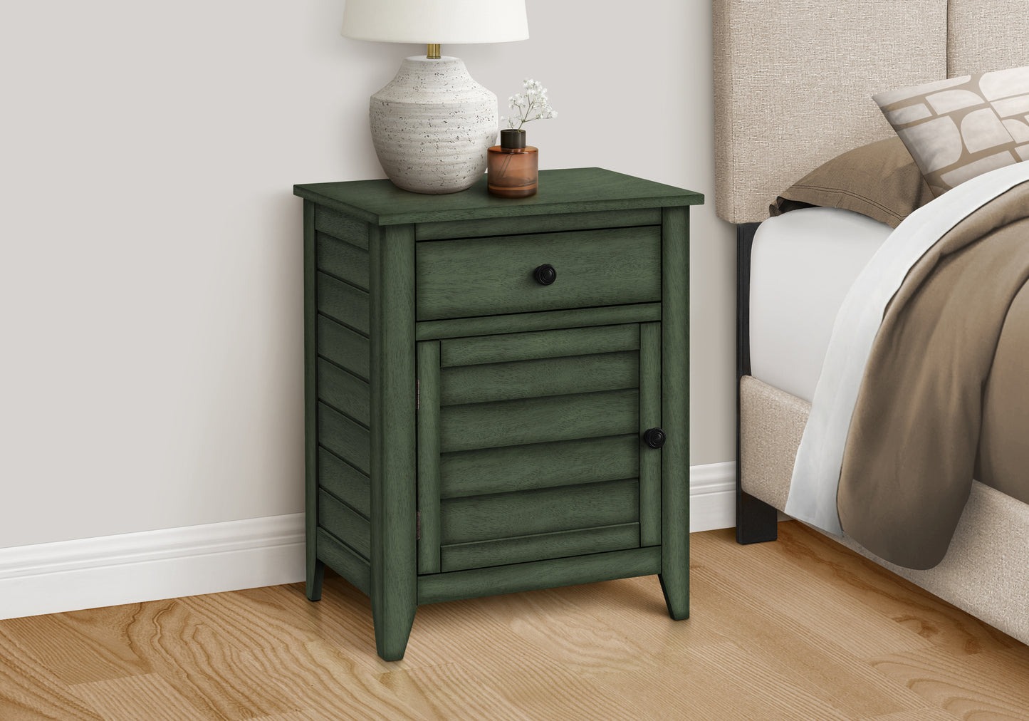 Dark green wooden nightstand with louvered door and drawer