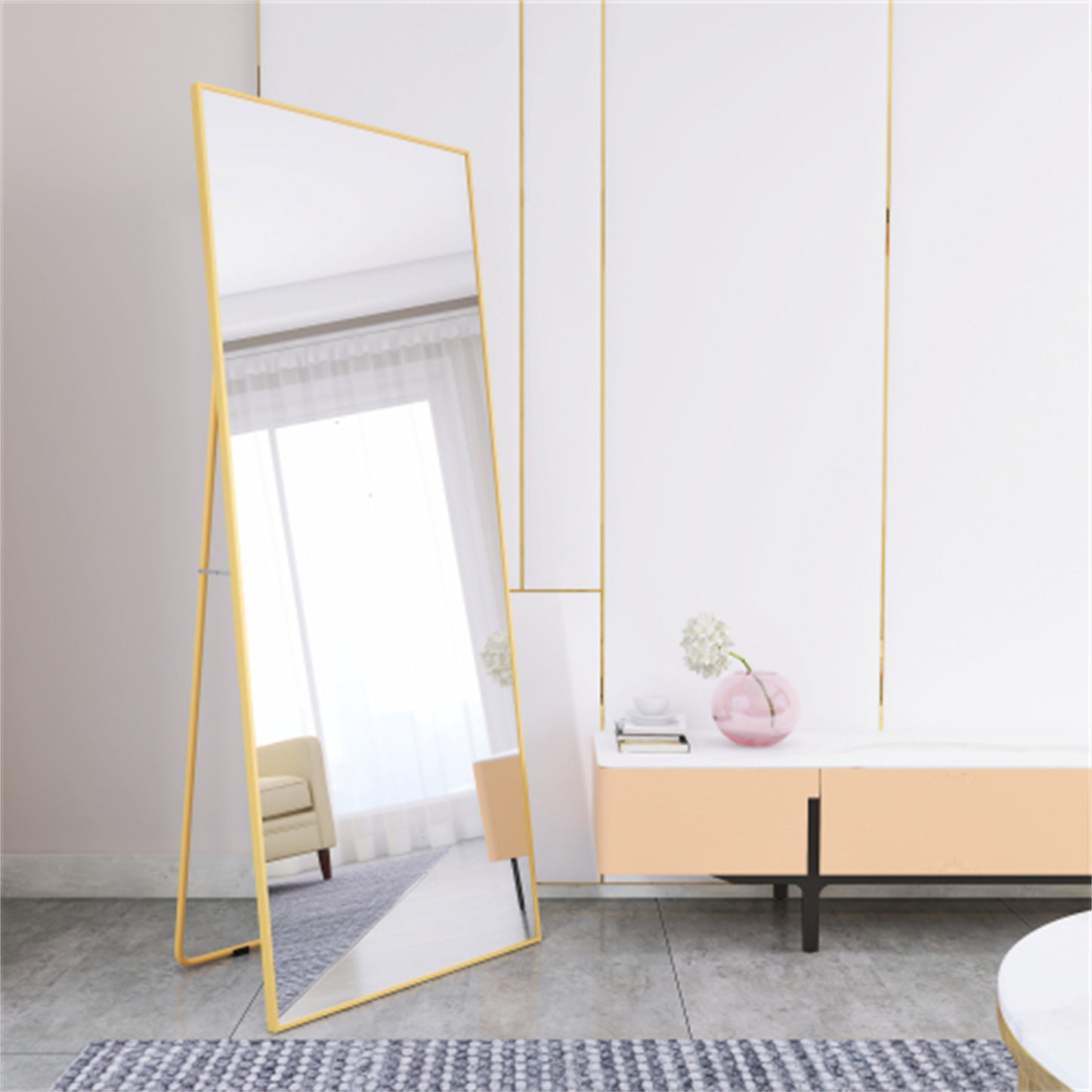 Tall gold floor mirror with slender legs
