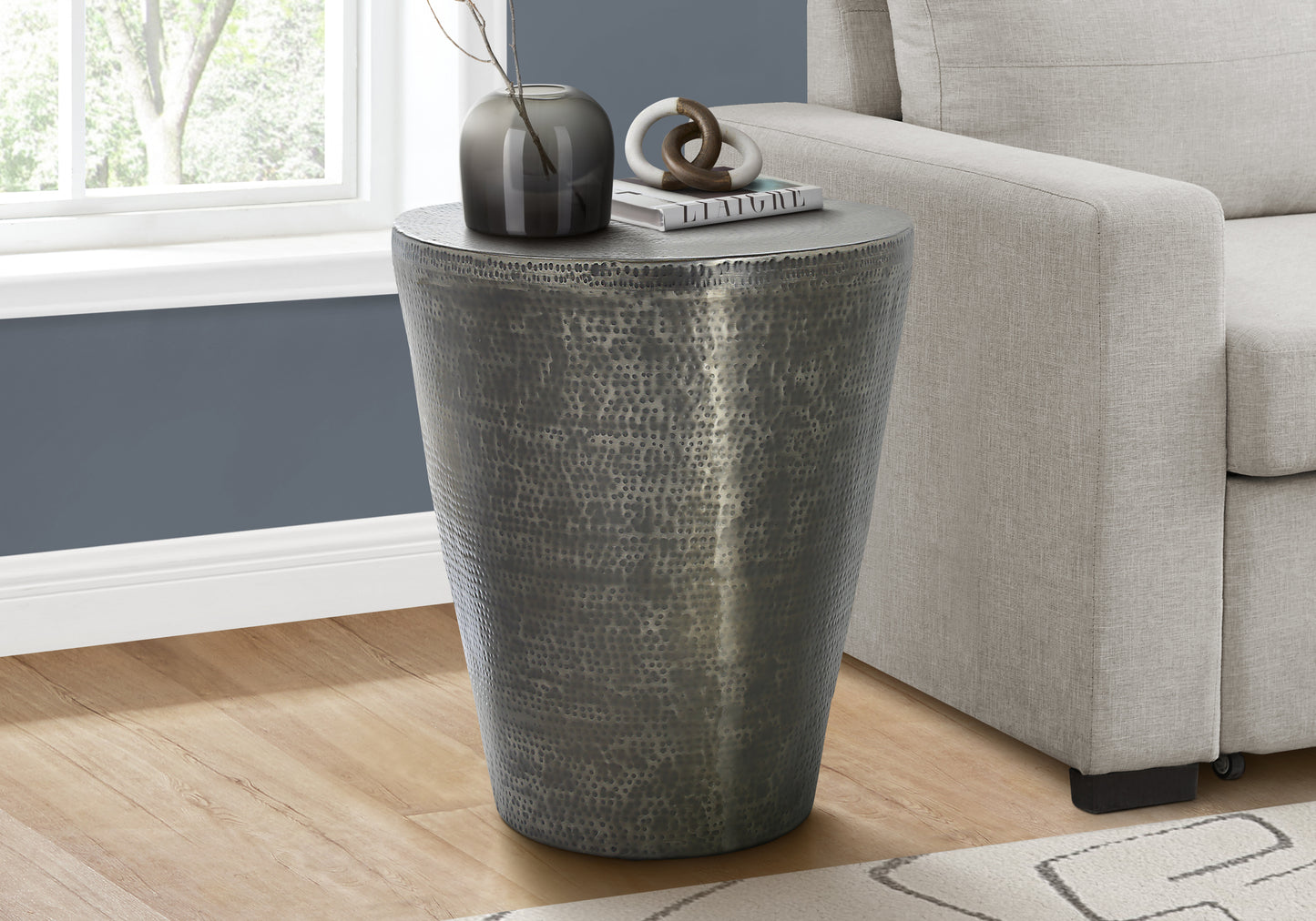 Textured metal drum side table with hammered finish gunmetal gray