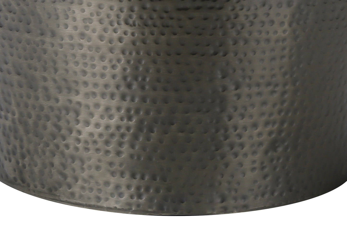 Textured hammered metal side table with antique bronze finish