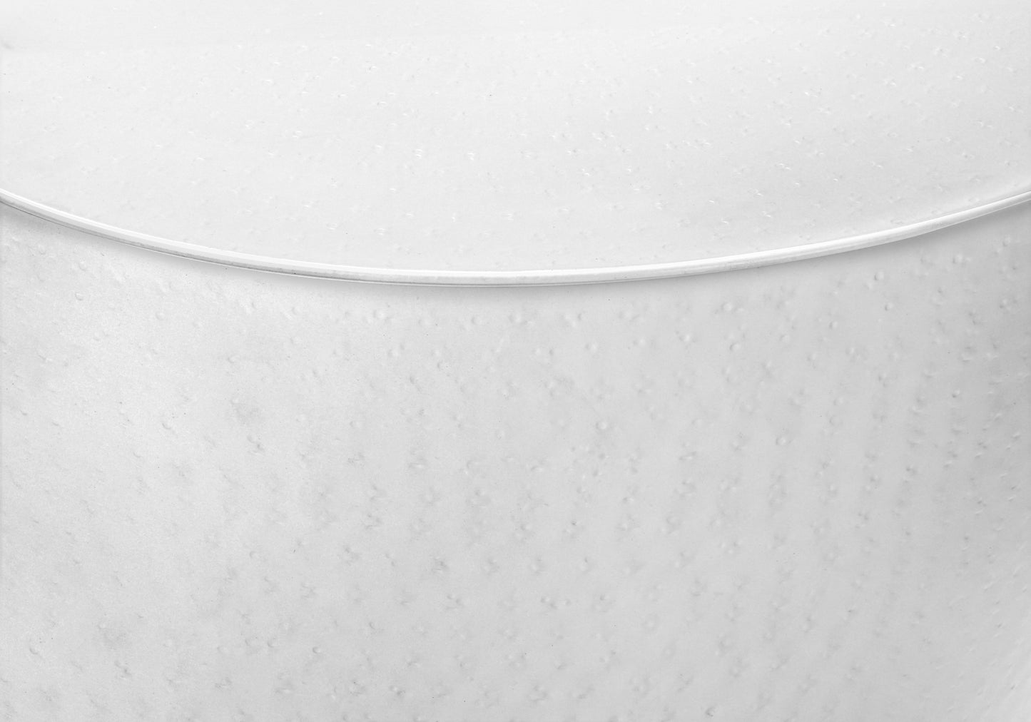 Textured white metal bucket with a rim perfect for home decor