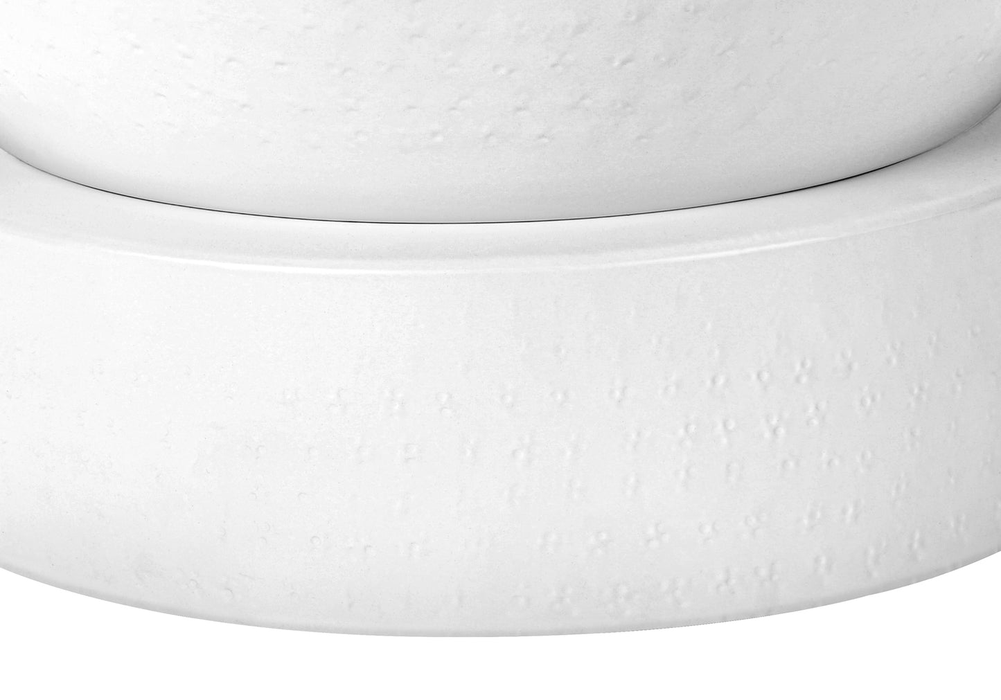 Closeup of a textured white ceramic vase with a subtle embossed pattern