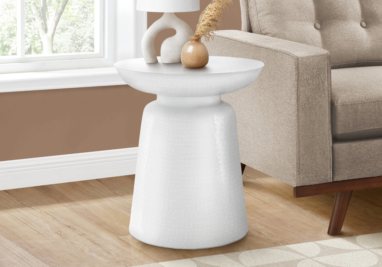 White ceramic drum accent table with subtle textured pattern